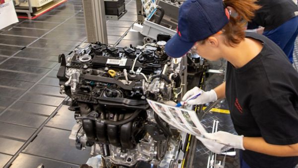 Skilled employee checking engine